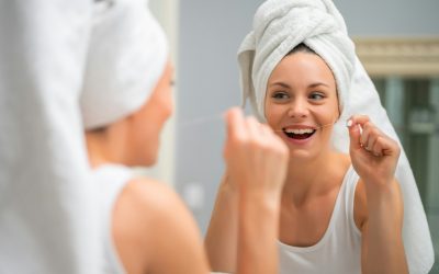 Cleaning teeth with dental floss