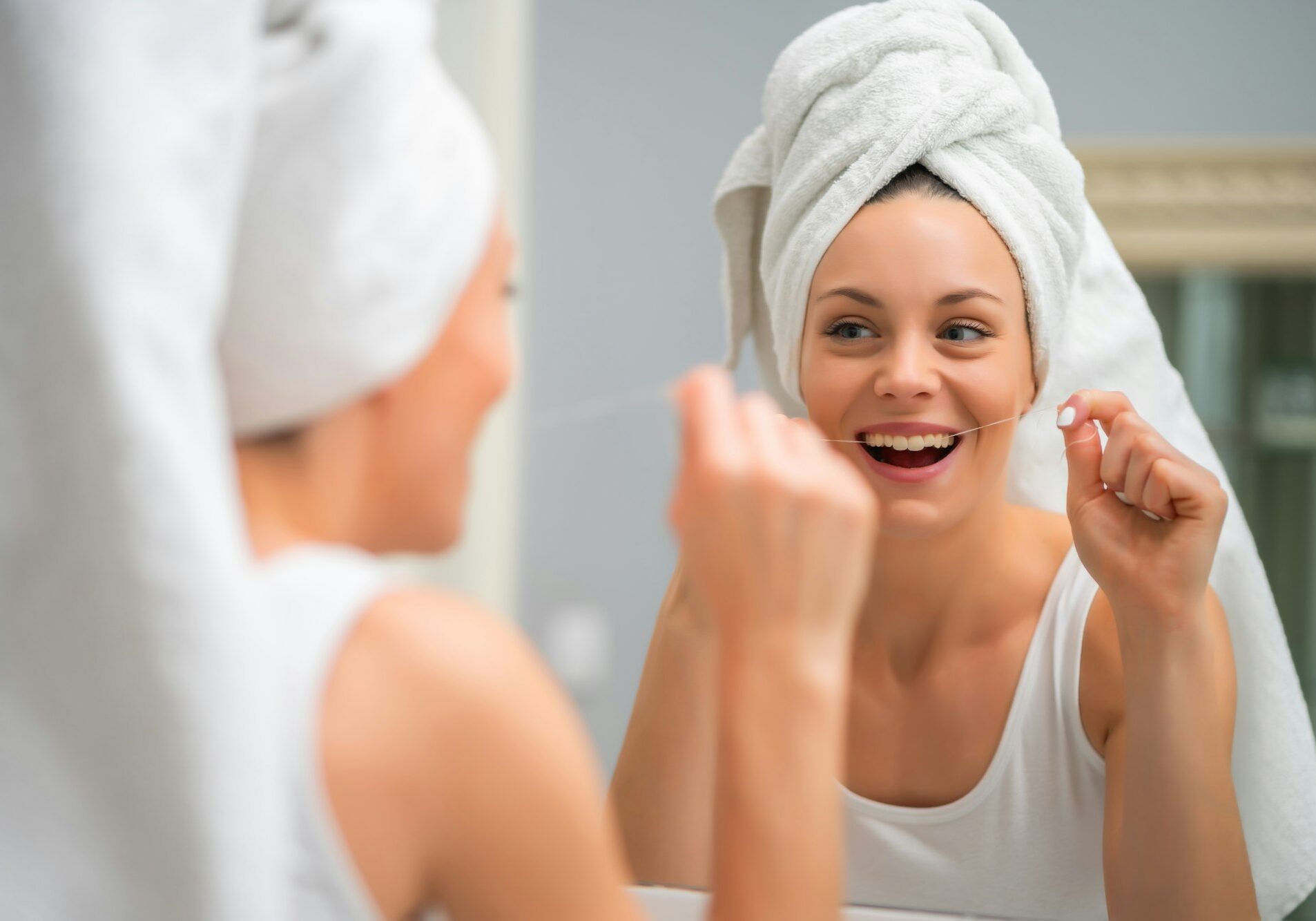 Cleaning teeth with dental floss